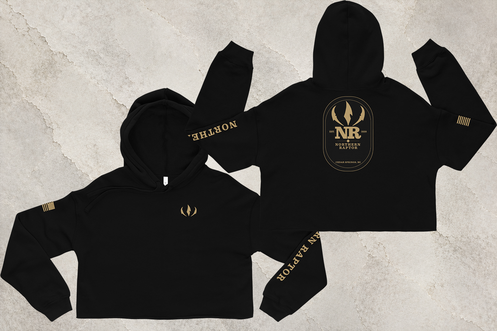 Northern Raptor Heritage Crop Hoodie in black with Heritage crest graphic front view