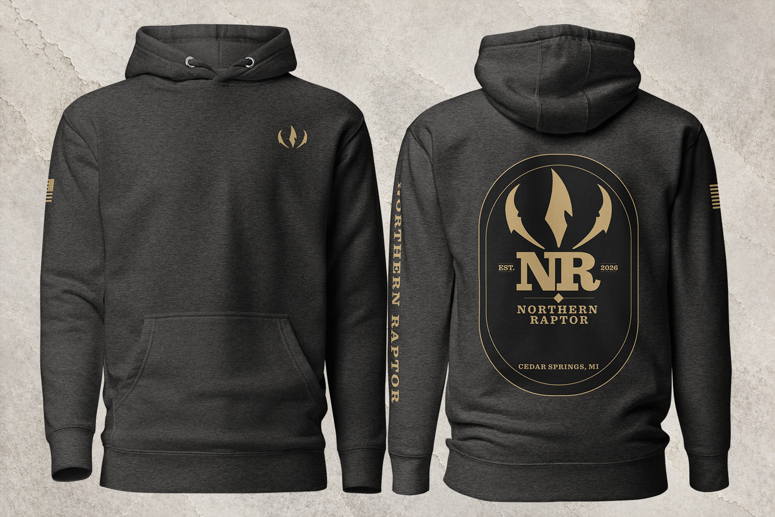 Northern Raptor Heritage Crest charcoal heavyweight hoodie with brass badge graphic