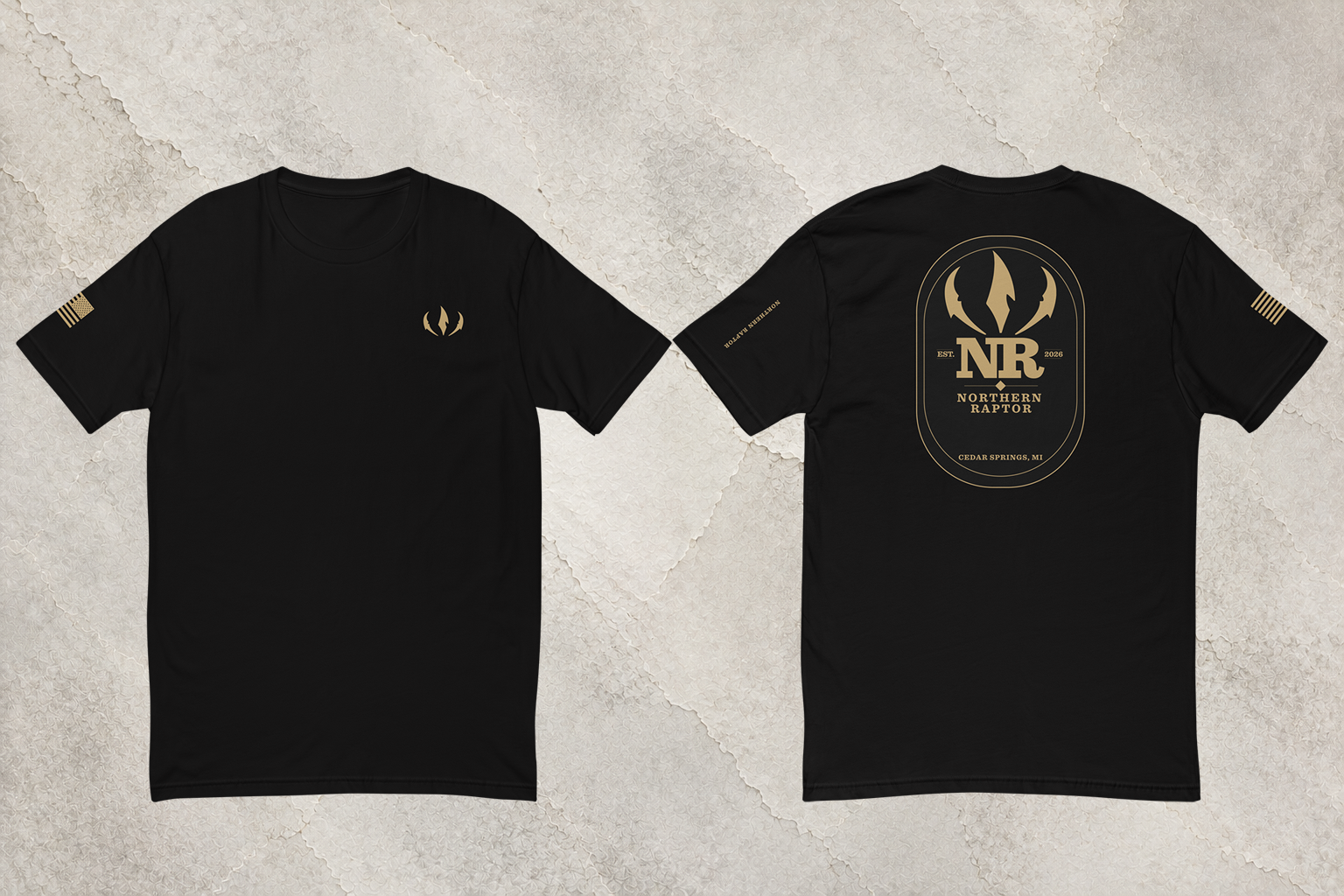 Northern Raptor Heritage T-Shirt in black with front crest and Heritage back graphic on light background